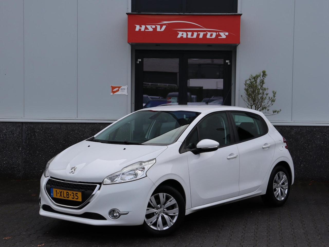 Peugeot 208 - 1.2 VTi Envy navi 4-deurs parkeersensor org NL - AutoWereld.nl