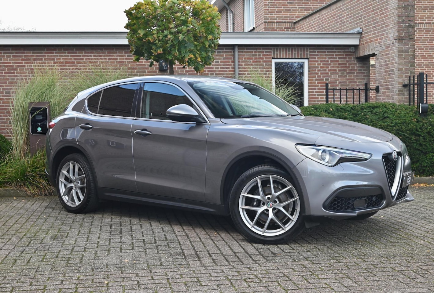 Alfa Romeo Stelvio - 2.0 T AWD Super First Edition 280 PK Leder Camera Keyless Stoel/Stuurverw. Elek Klep 20'' - AutoWereld.nl
