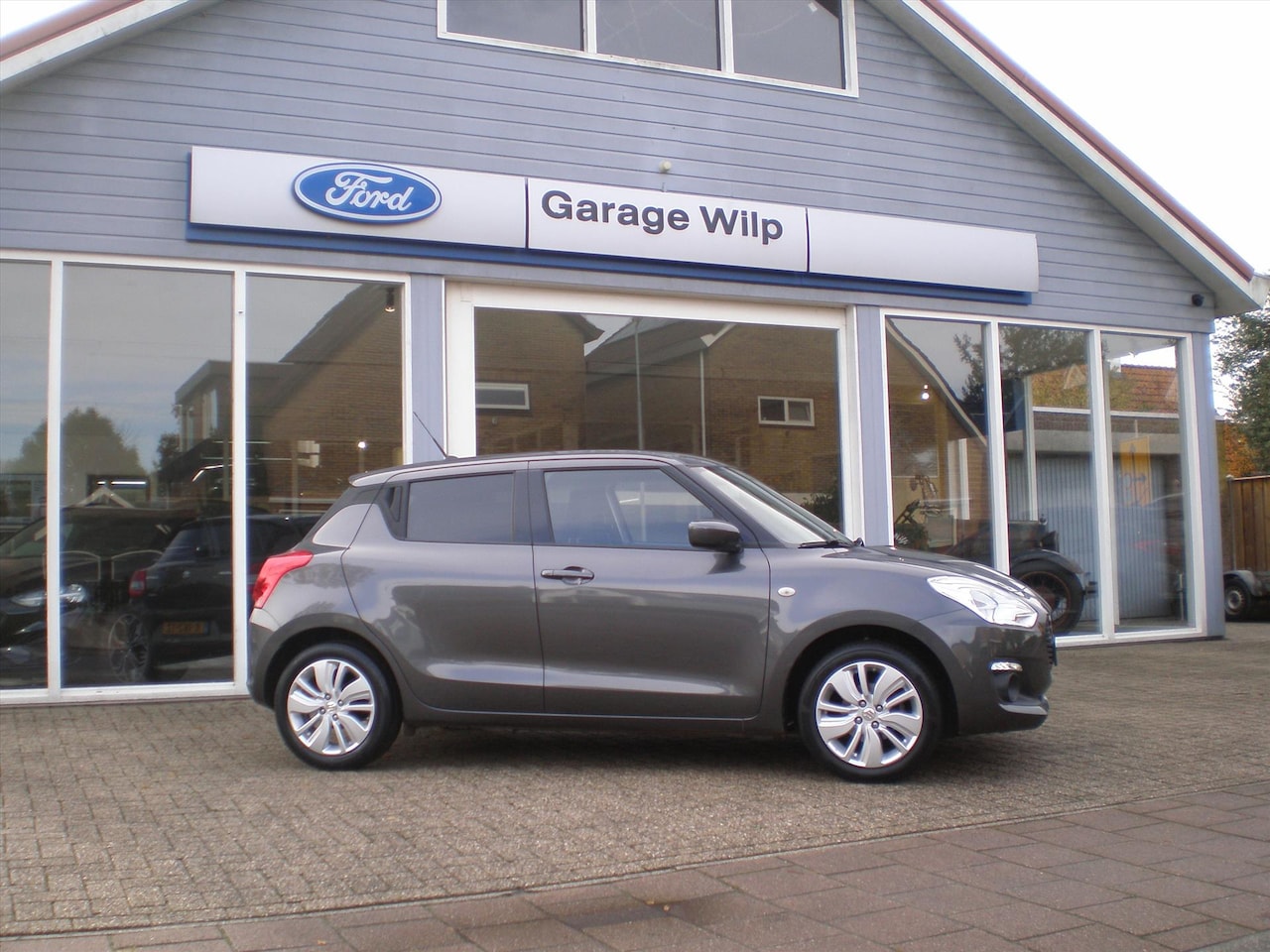 Suzuki Swift - 1.2 DualJet 90pk Smart Hybrid S&S Select - AutoWereld.nl