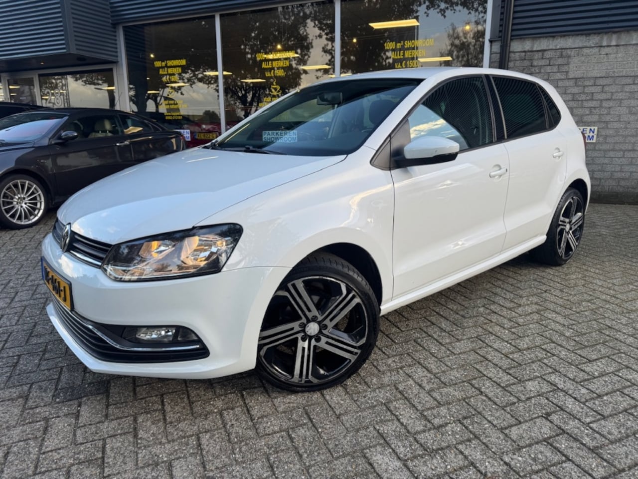 Volkswagen Polo - 1.2 TSI Comfortline Carplay/L.M. - AutoWereld.nl