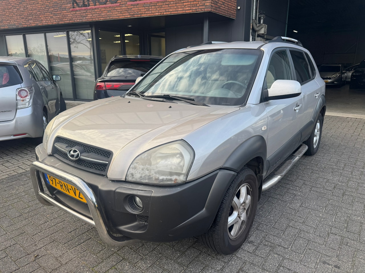 Hyundai Tucson - 2.0i Dynamic AIRCO TREKHAAK ORIG NL NAP - AutoWereld.nl