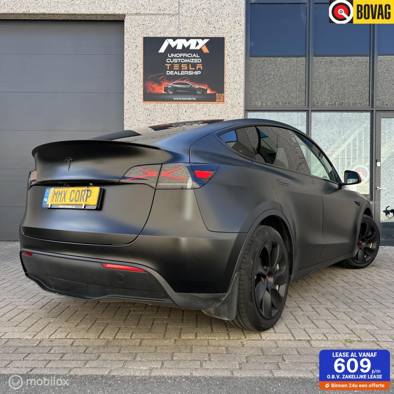 Tesla Model Y - + MMX Pack + SATIN BLACK WRAP - AutoWereld.nl