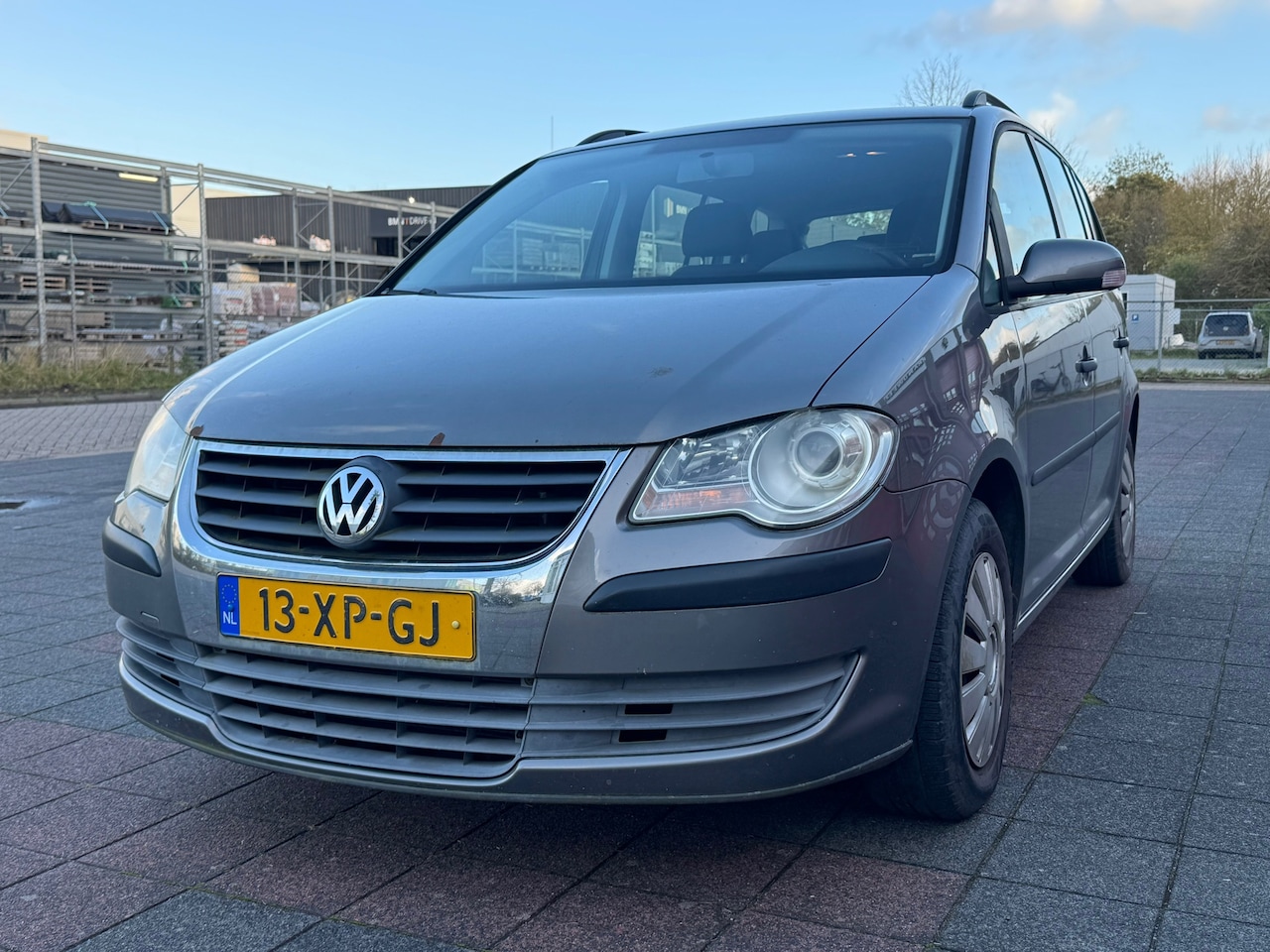 Volkswagen Touran - 1.6 Optive 75kw 7P - AutoWereld.nl