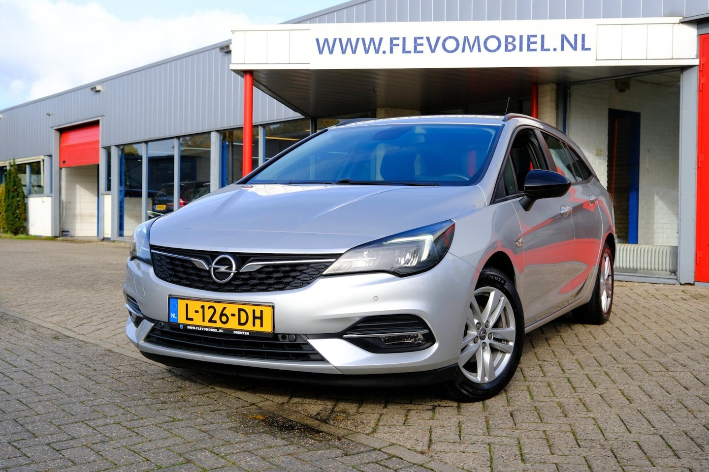 Opel Astra Sports Tourer - 1.5 CDTI Edition Aut. Navi|1e eigenaar|LMV|Airco|Carplay - AutoWereld.nl