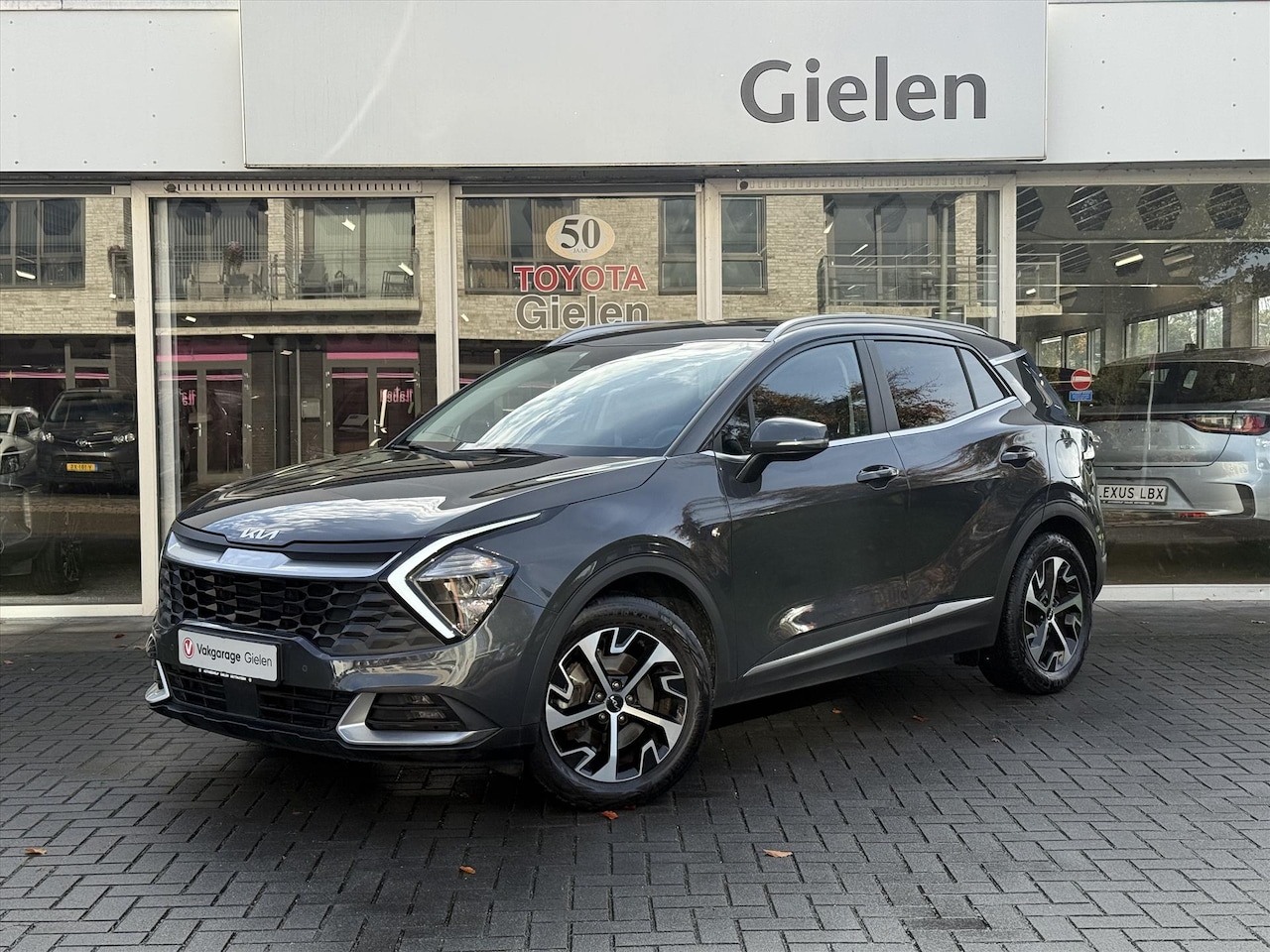 Kia Sportage - 1.6 T-GDi HEV DynamicLine | Stoel + Stuurverwarming, Groot scherm, CarPlay, Keyless, 18inc - AutoWereld.nl