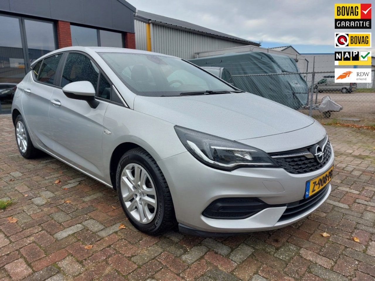Opel Astra - 1.2 Business Edition-NL AUTO-AIRCO-CRUISE-NAVI - AutoWereld.nl
