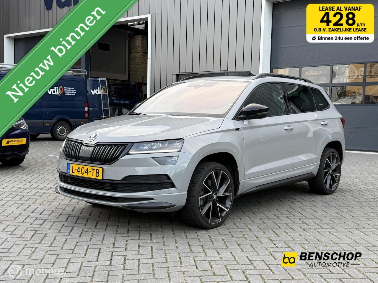 Skoda Karoq - 1.5 TSI ACT Sportline Panodak Navi Carplay Virtual Canton Trekhaak NL Auto - AutoWereld.nl