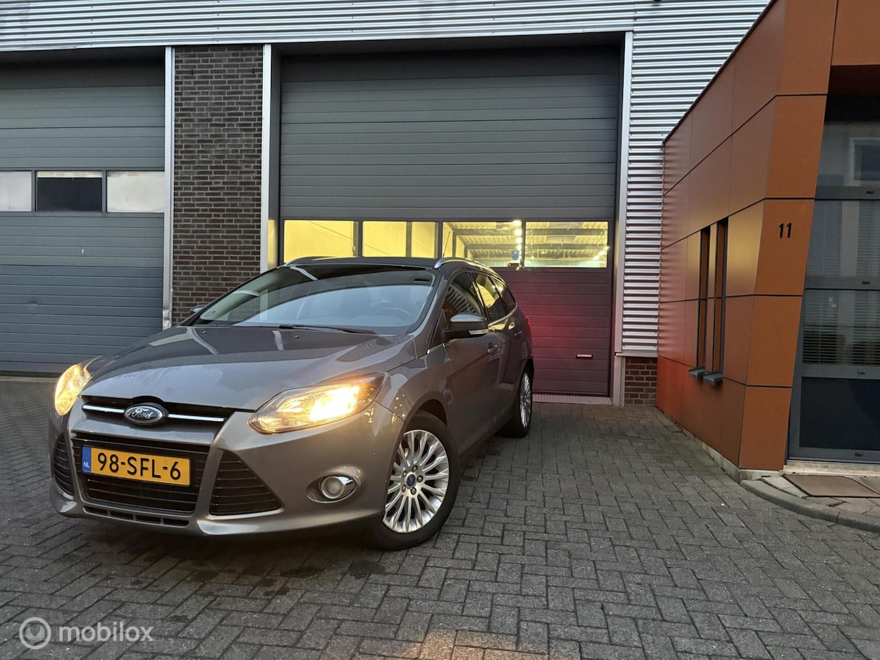 Ford Focus Wagon - 1.6 TI-VCT Titanium 1.6 TI-VCT Titanium - AutoWereld.nl