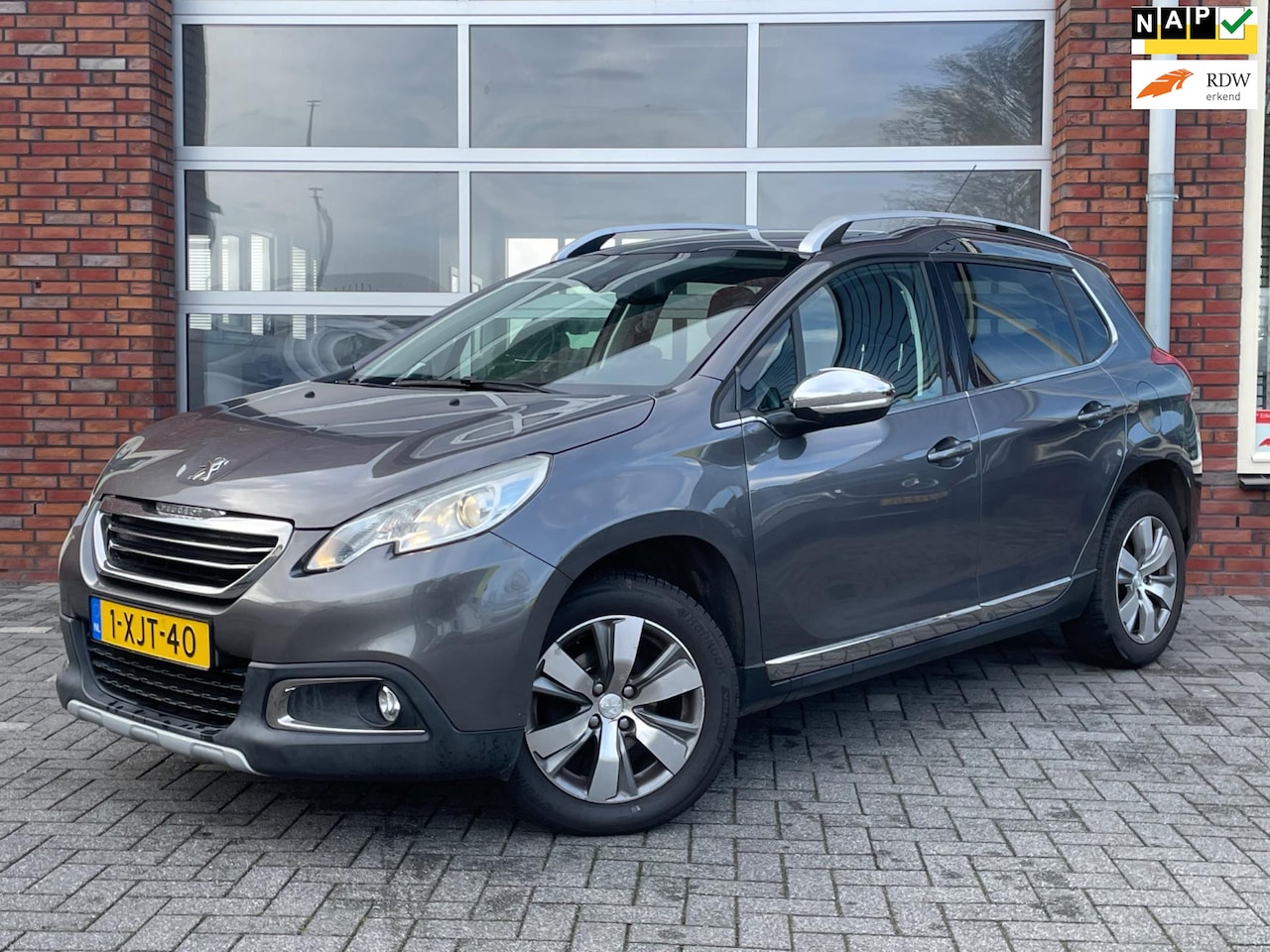 Peugeot 2008 - 1.2 VTi Allure Pack Premium Plus |Exportprijs | Panoramadak | Trekhaak | Cruise Control | - AutoWereld.nl