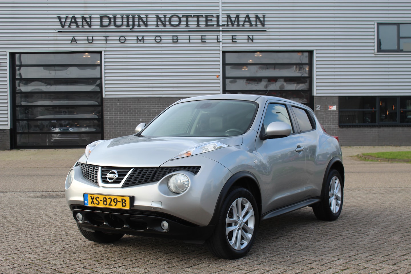 Nissan Juke - 1.6 Tekna / Automaat / Leer / Navigatie / Camera - AutoWereld.nl