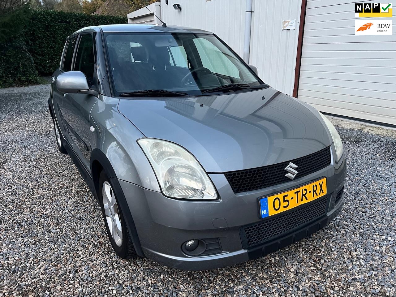 Suzuki Swift - 1.5 Exclusive AIRCO.NAVI.KEYLESS&GO.NAP! - AutoWereld.nl