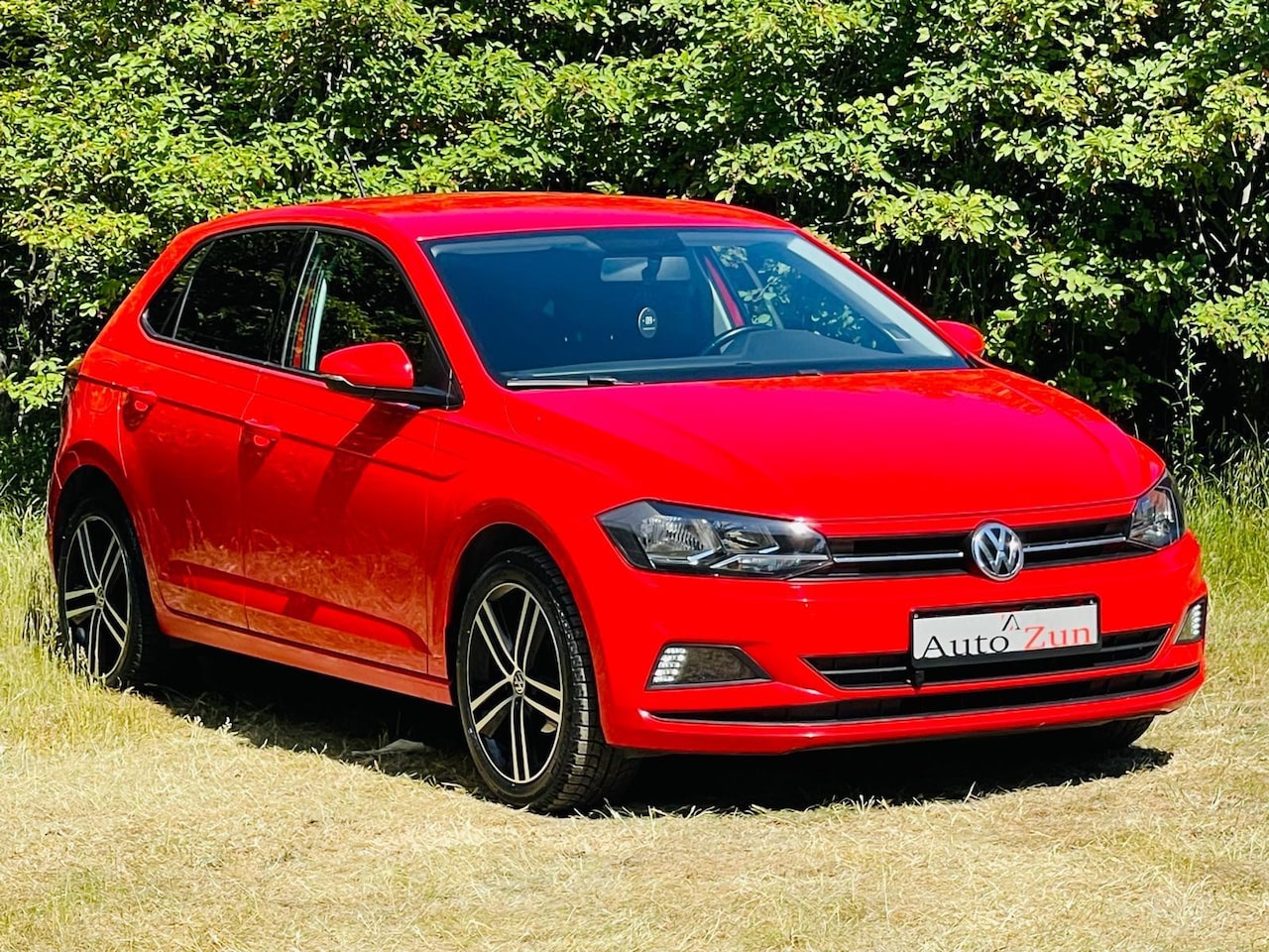 Volkswagen Polo - 1.0 TSI Comfortline Business/Car play/Fcaelift/Navi(Ferrari Red) - AutoWereld.nl