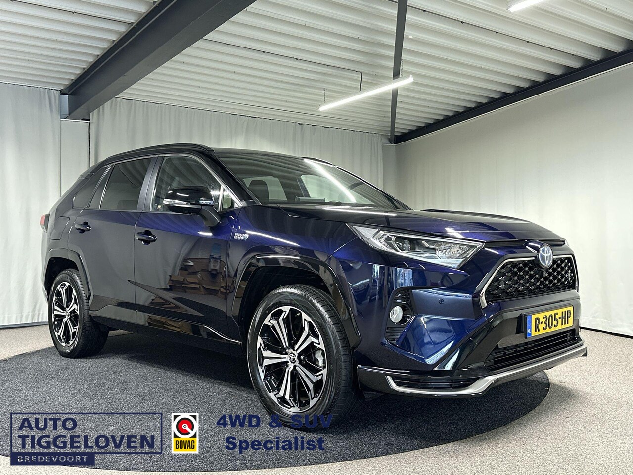 Toyota RAV4 - 2.5 Plug-in Hybrid AWD Bi-Tone Plus Automaat | Trekhaak | Leder | Memory | Navi - AutoWereld.nl
