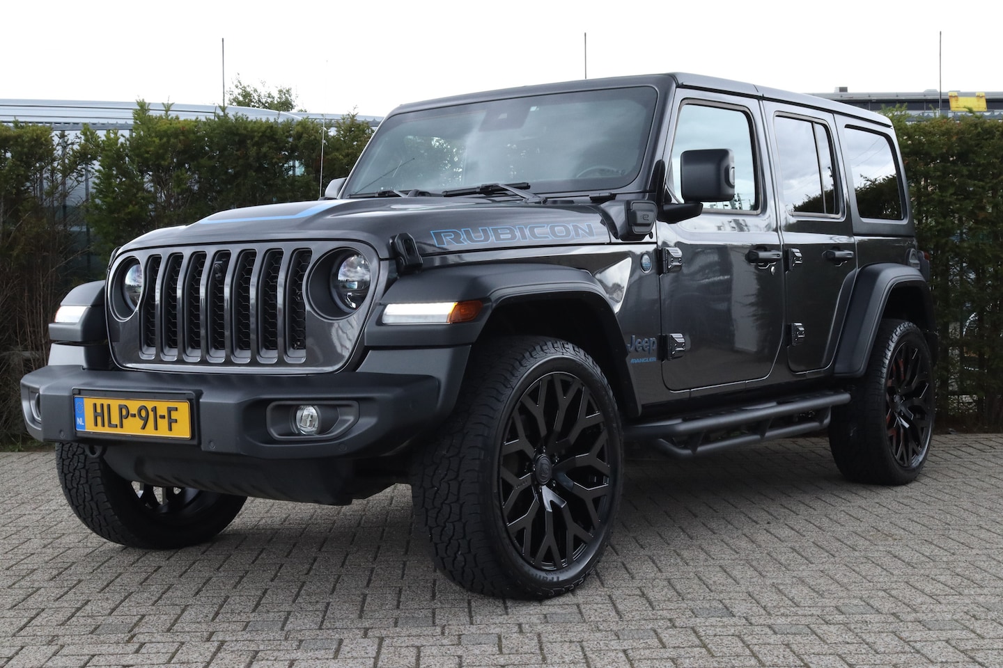 Jeep Wrangler Unlimited - 4xe 380 Rubicon Brute wielen | Adaptive Cruise | Trekhaak | Stoel+Stuur verwarming | Camer - AutoWereld.nl