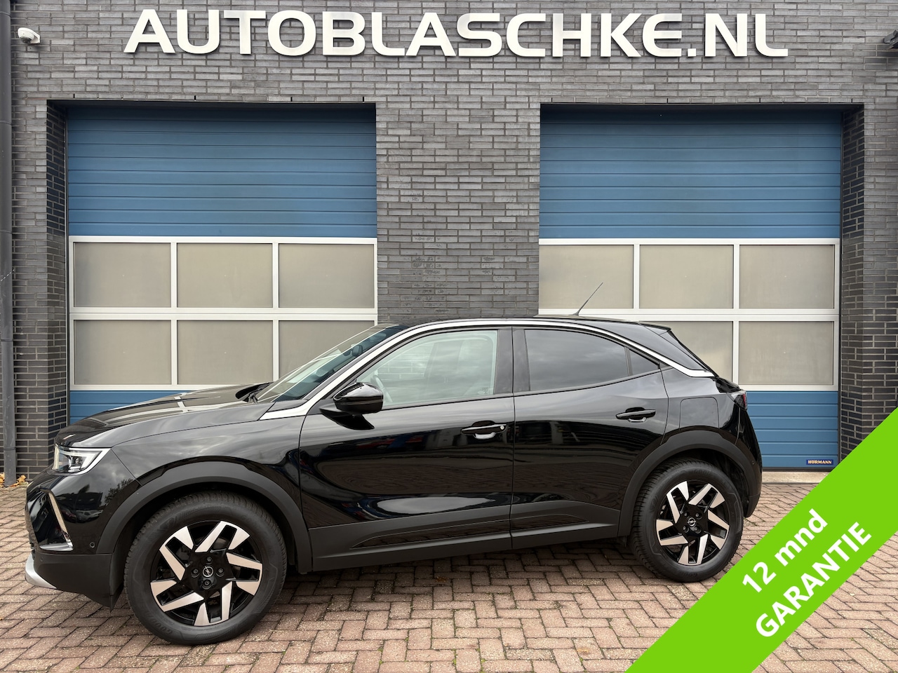 Opel Mokka - 1.2 Turbo Ultimate 1.2 Turbo Ultimate, navi, cruise/camera, all season banden - AutoWereld.nl