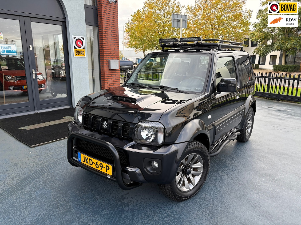 Suzuki Jimny - 1.3 Rhino 4X4 LEDER LMV AIRCO - AutoWereld.nl