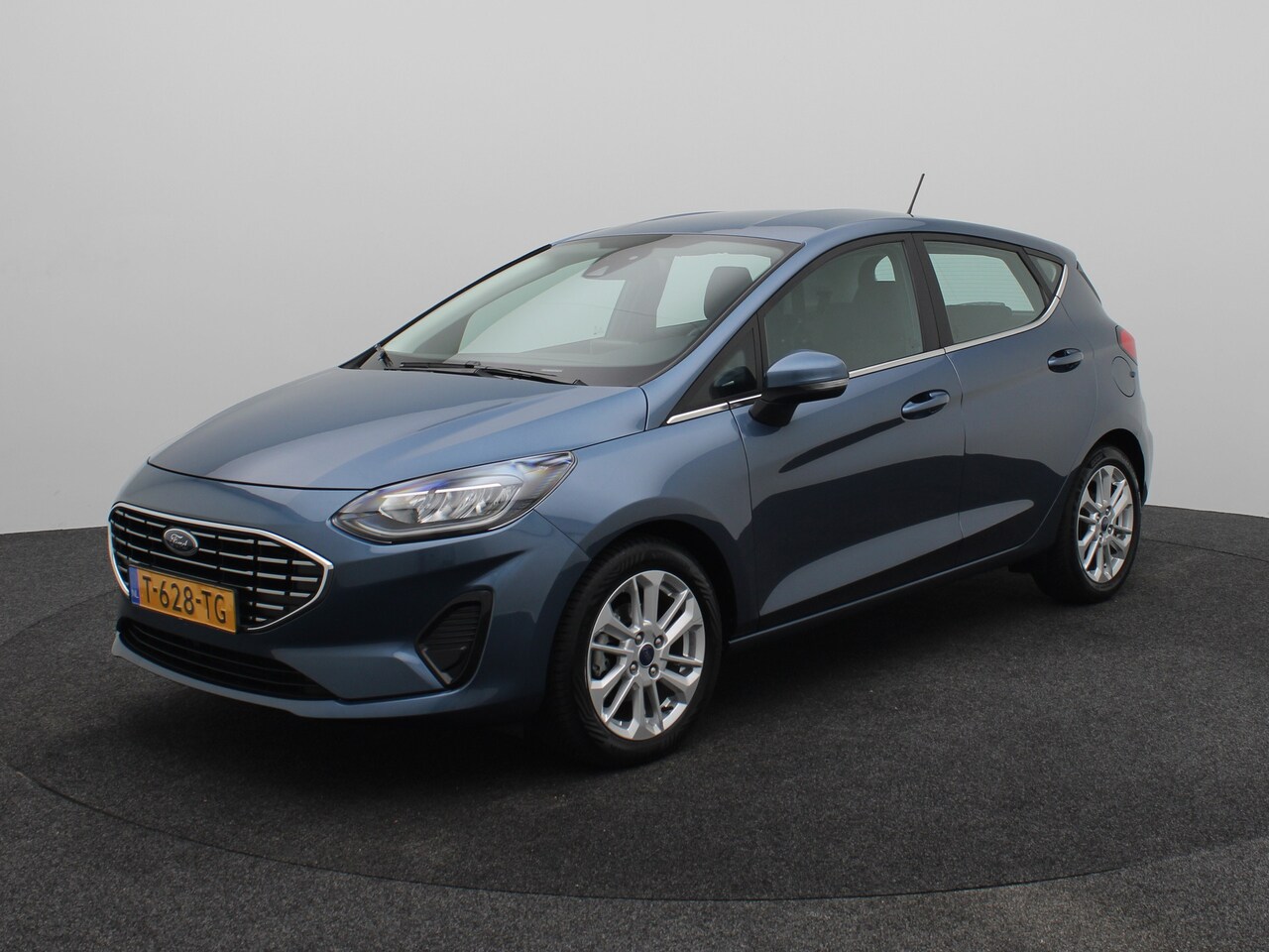 Ford Fiesta - 1.0 EcoBoost Hybrid Titanium | Airco (automatisch) | Boordcomputer | Cruise control - AutoWereld.nl