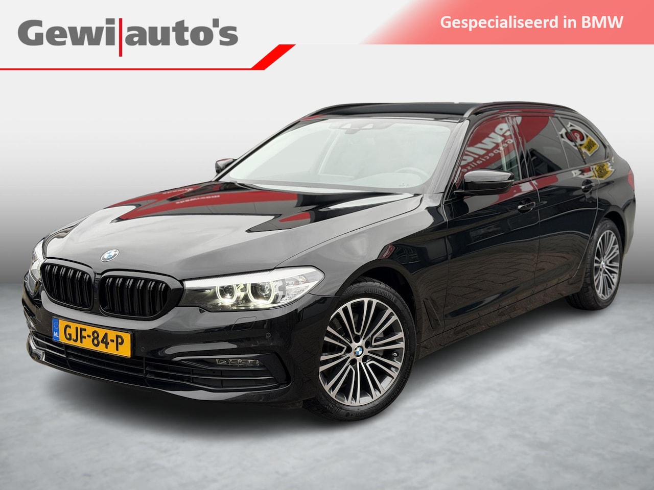 BMW 5-serie Touring - 520i High Executive Alles zwart! - AutoWereld.nl
