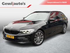 BMW 5-serie Touring - 520i High Executive Alles zwart