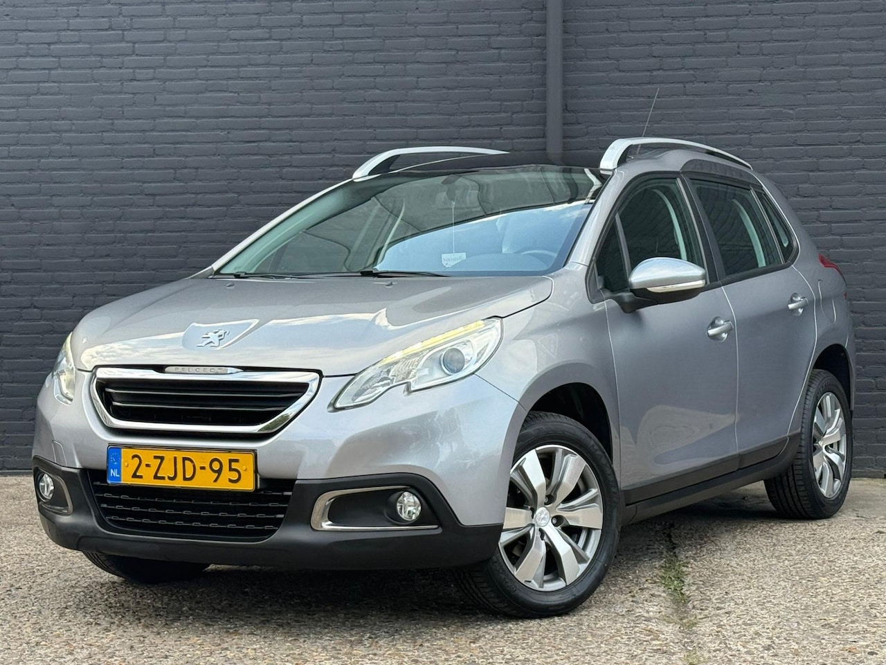 Peugeot 2008 - 1.2 PureTech Active | NAVI | AIRCO | CRUISE | PANO | NWE APK - AutoWereld.nl