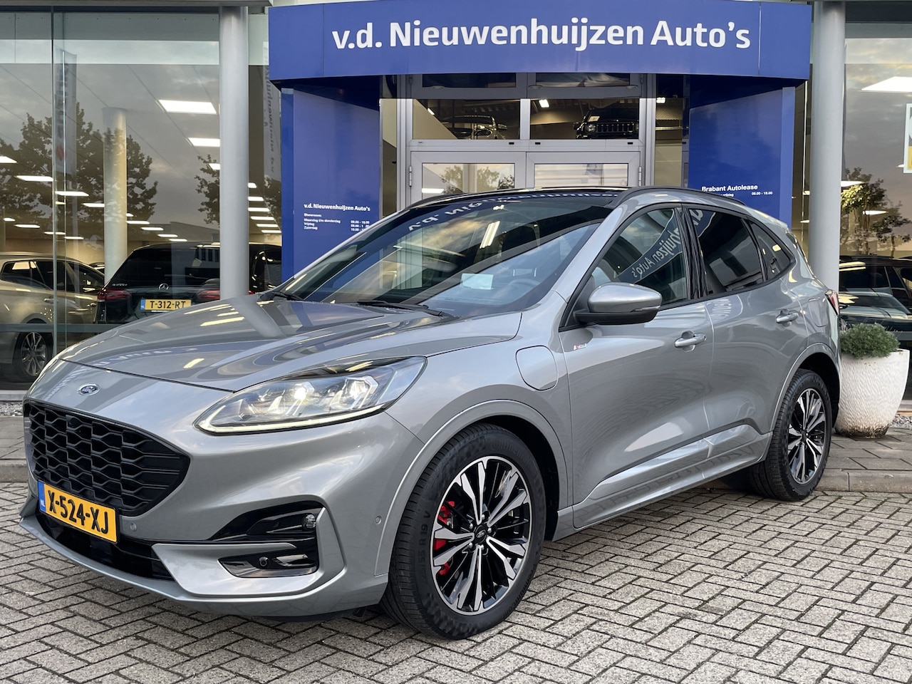 Ford Kuga - 2.5 PHEV ST-Line X | Stoelverwarming voor en achter | Panoramadak | Keyless | Dodehoek | i - AutoWereld.nl