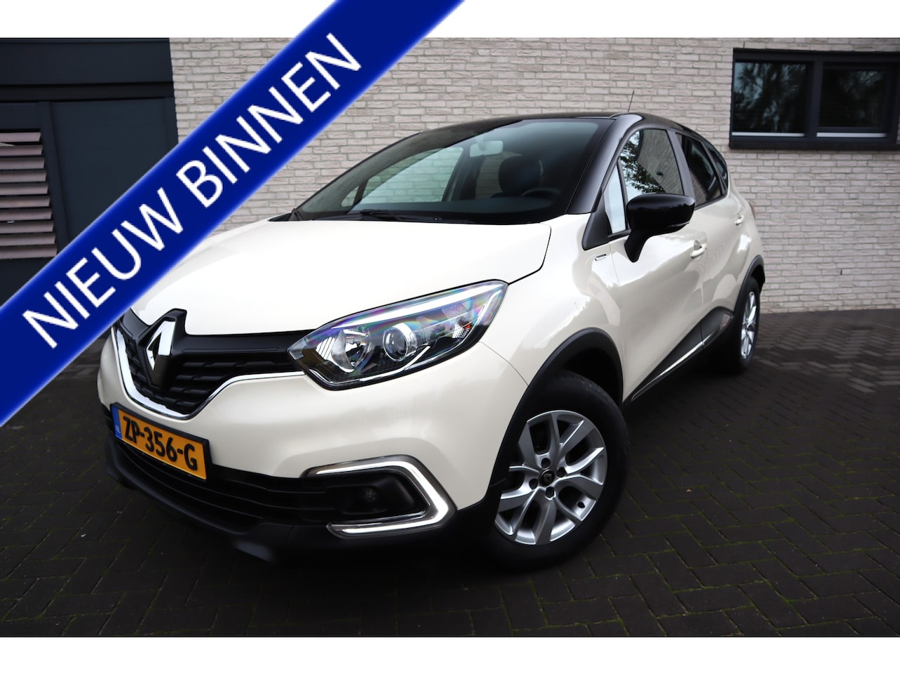 Renault Captur - 0.9 TCe Limited Navigatie Cruise control Airco Trekhaak Pdc. Etc. - AutoWereld.nl