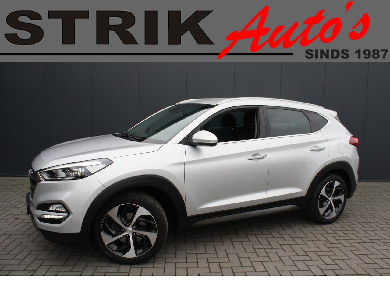 Hyundai Tucson - 1.6 T-GDi 177PK Premium - LEDER - NAVIGATIE - CAMERA - TREKHAAK - PDC - AutoWereld.nl