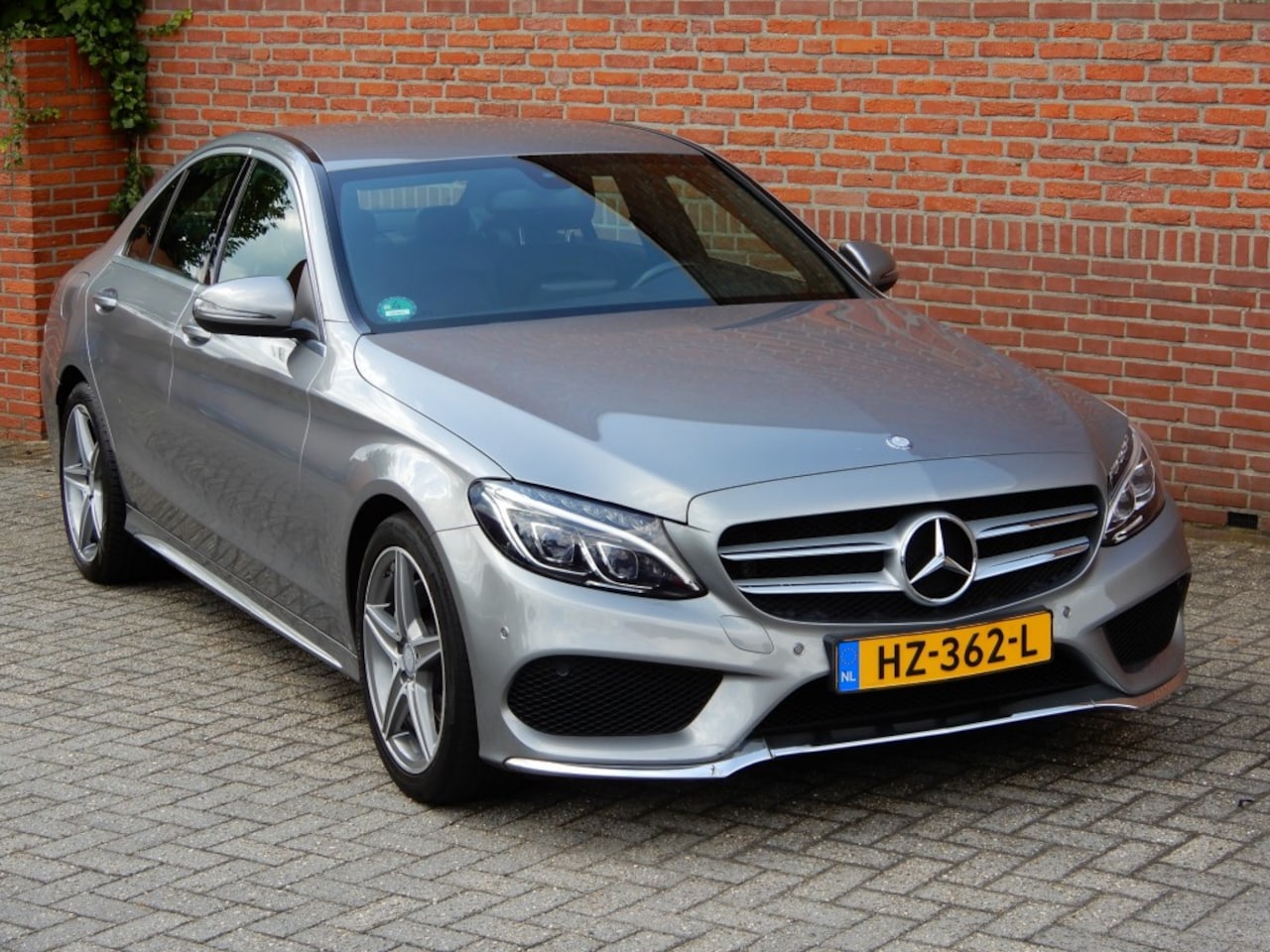 Mercedes-Benz C-klasse - 180 AMG LINE  leer  64.000km - AutoWereld.nl