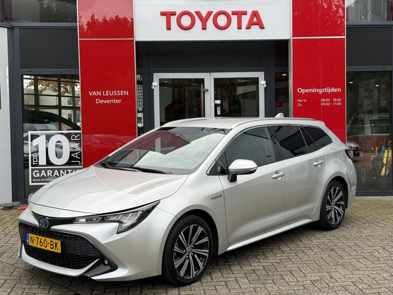 Toyota Corolla Touring Sports - 2.0 HYBRID 180PK TEAM-NL AD-CRUISE CAMERA LM-VELGEN NL-AUTO - AutoWereld.nl