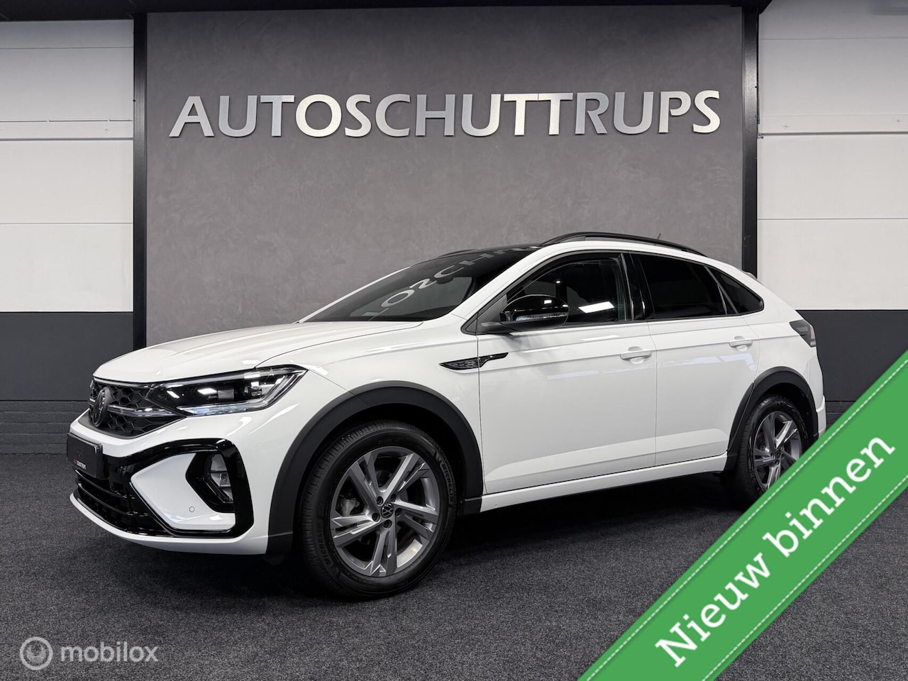 Volkswagen Taigo - 1.0 TSI R-Line DSG / IQ Light / Carplay / Camera / Clima / Adap.Cruise / Trekhaak / Virt. - AutoWereld.nl