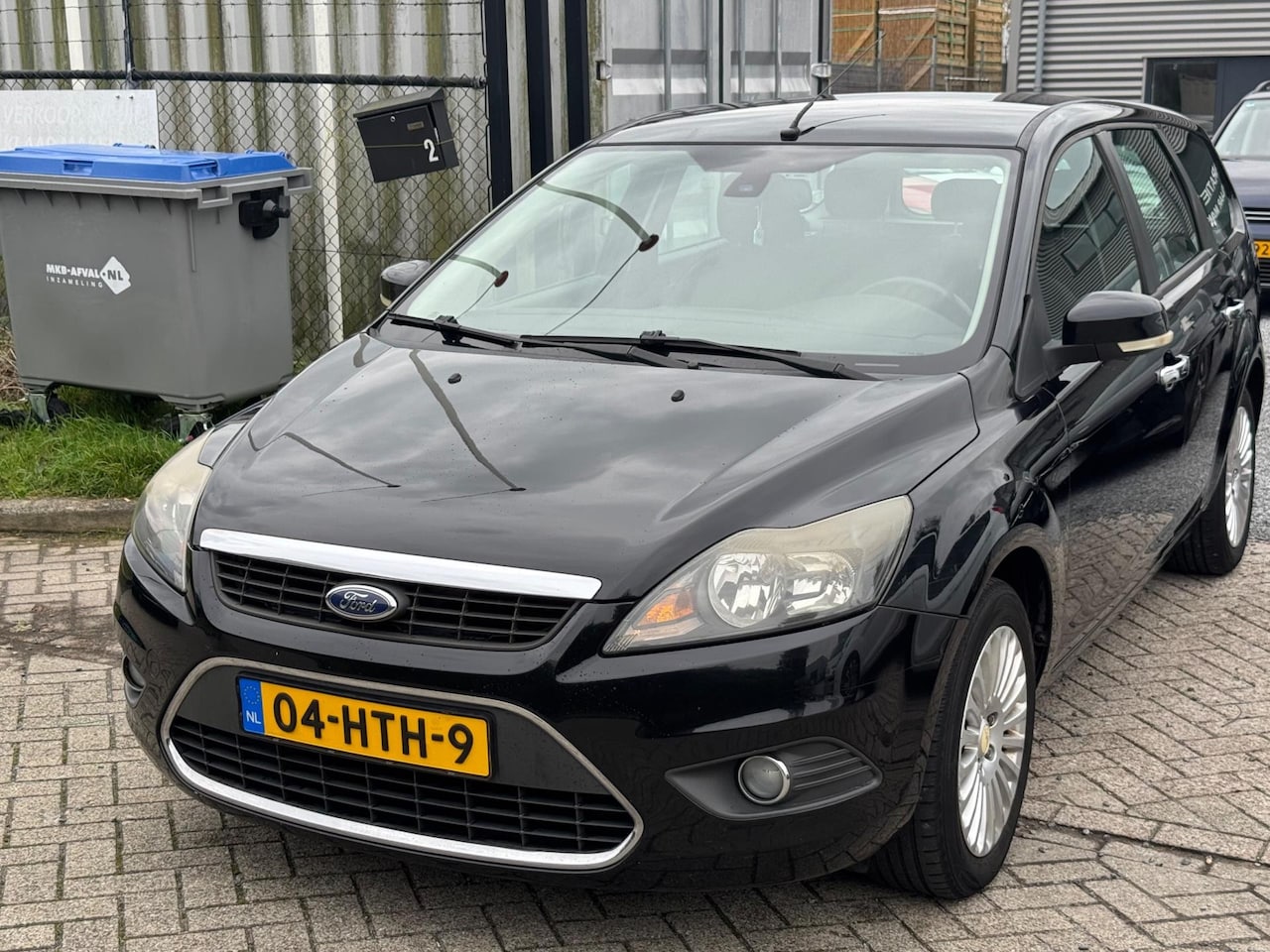 Ford Focus Wagon - 1.6 Titanium Clima Navi Zwart - AutoWereld.nl