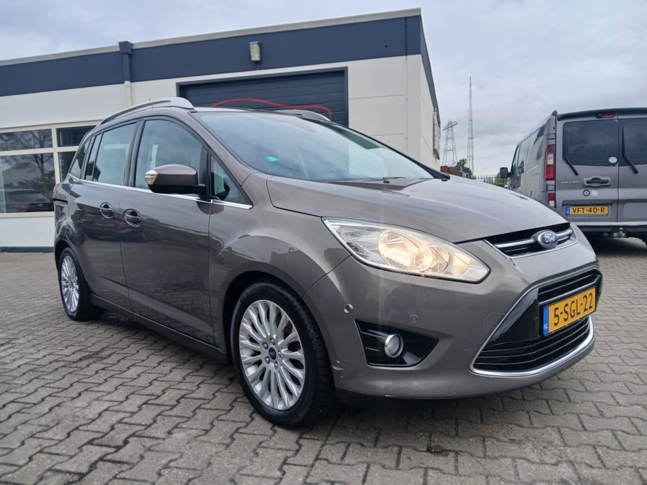 Ford Grand C-Max - 1.0 Titanium/Schuifdeuren/Camera/Apk 09-'26 - AutoWereld.nl
