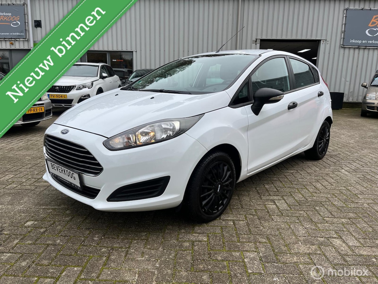 Ford Fiesta - 1.25 / 82 pk Black & White Edition - AutoWereld.nl