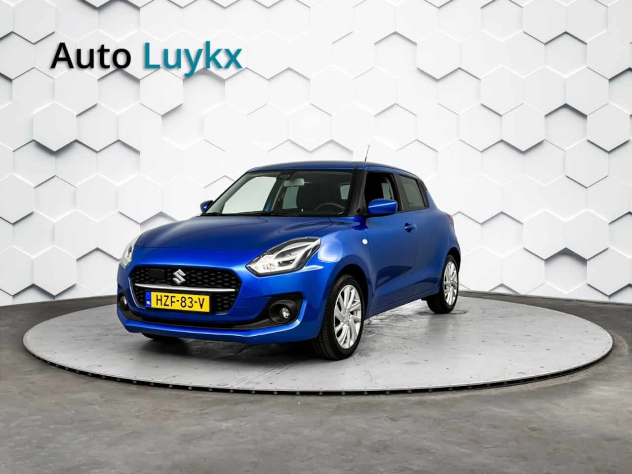 Suzuki Swift - 1.2 Select Smart Hybrid | Navigatie | Adaptieve Cruise Control | 16'' L.M. velgen - AutoWereld.nl