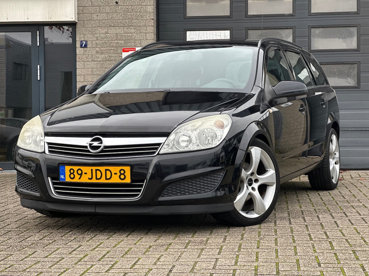 Opel Astra Wagon - 1.6 Essentia / NAP / Navi / Cruise Control / Airco / 18' Irmscher Velgen - AutoWereld.nl