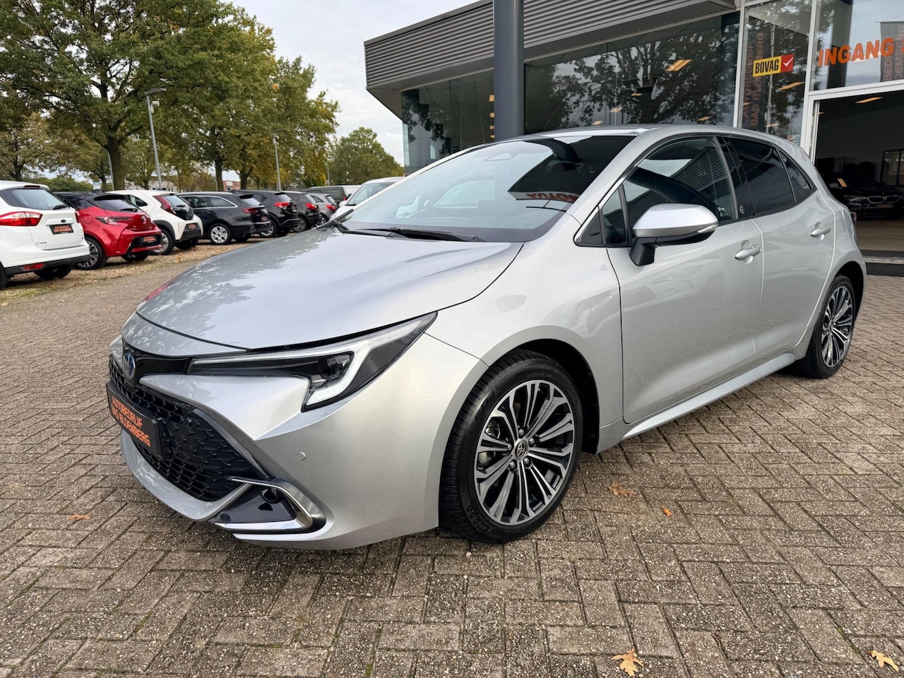 Toyota Corolla - Hybrid 140 Business, Automaat, Apple carplay, Cruise, Clima, Stuur/ steol verwarming, Half - AutoWereld.nl