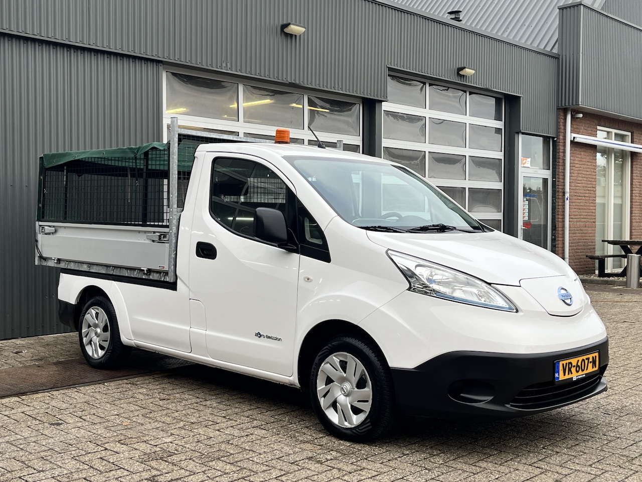 Nissan e-NV200 - 24kWh 100% electrische Pick-up Openlaadbak Airco Cruise controle Telefoonverbinding 2-Pers - AutoWereld.nl
