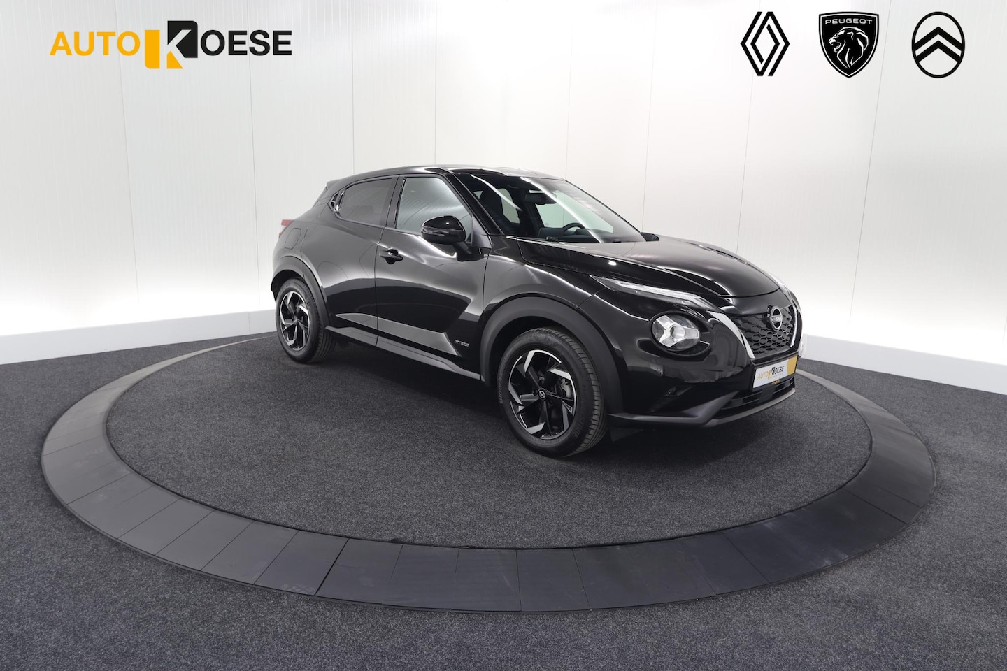 Nissan Juke - 1.6 Hybrid Business Premium | Camera | Apple Carplay | Parkeersensoren - AutoWereld.nl