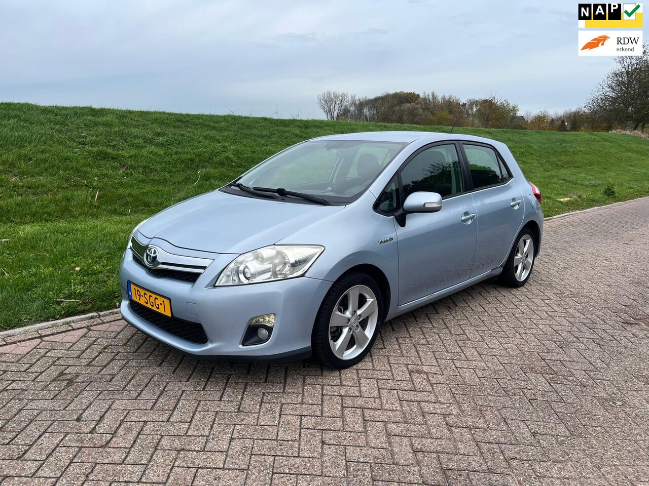 Toyota Auris - 1.8 Full Hybrid Executive Automaat Cruise Airco Navi Half Leder Pdc Achter Mist Lampen Voo - AutoWereld.nl