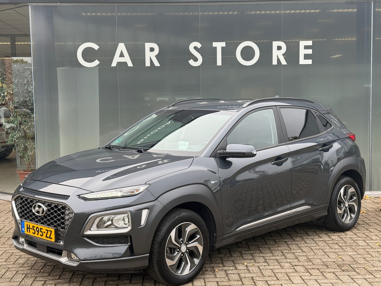 Hyundai Kona - 1.6 GDI HEV Fashion Navi|Trekhaak|Camera|Dealer Onderhouden - AutoWereld.nl