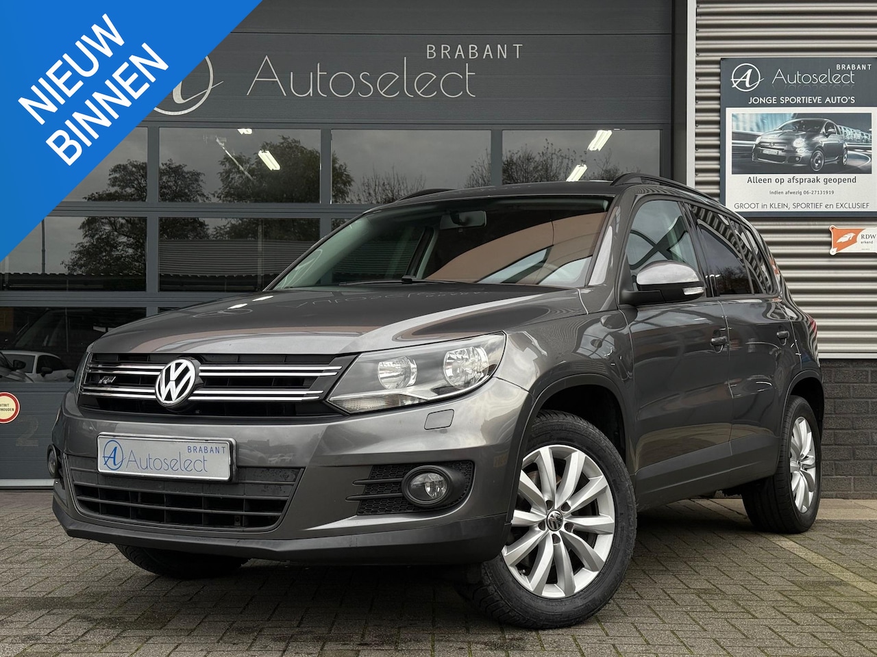 Volkswagen Tiguan - 1.4 TSI Comfort&Design Clima Bluetooth LMV - AutoWereld.nl
