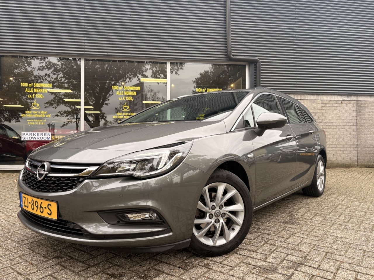 Opel Astra Sports Tourer - 1.4 T. Business Ex. Navi/Camera/Clima/Cruise - AutoWereld.nl