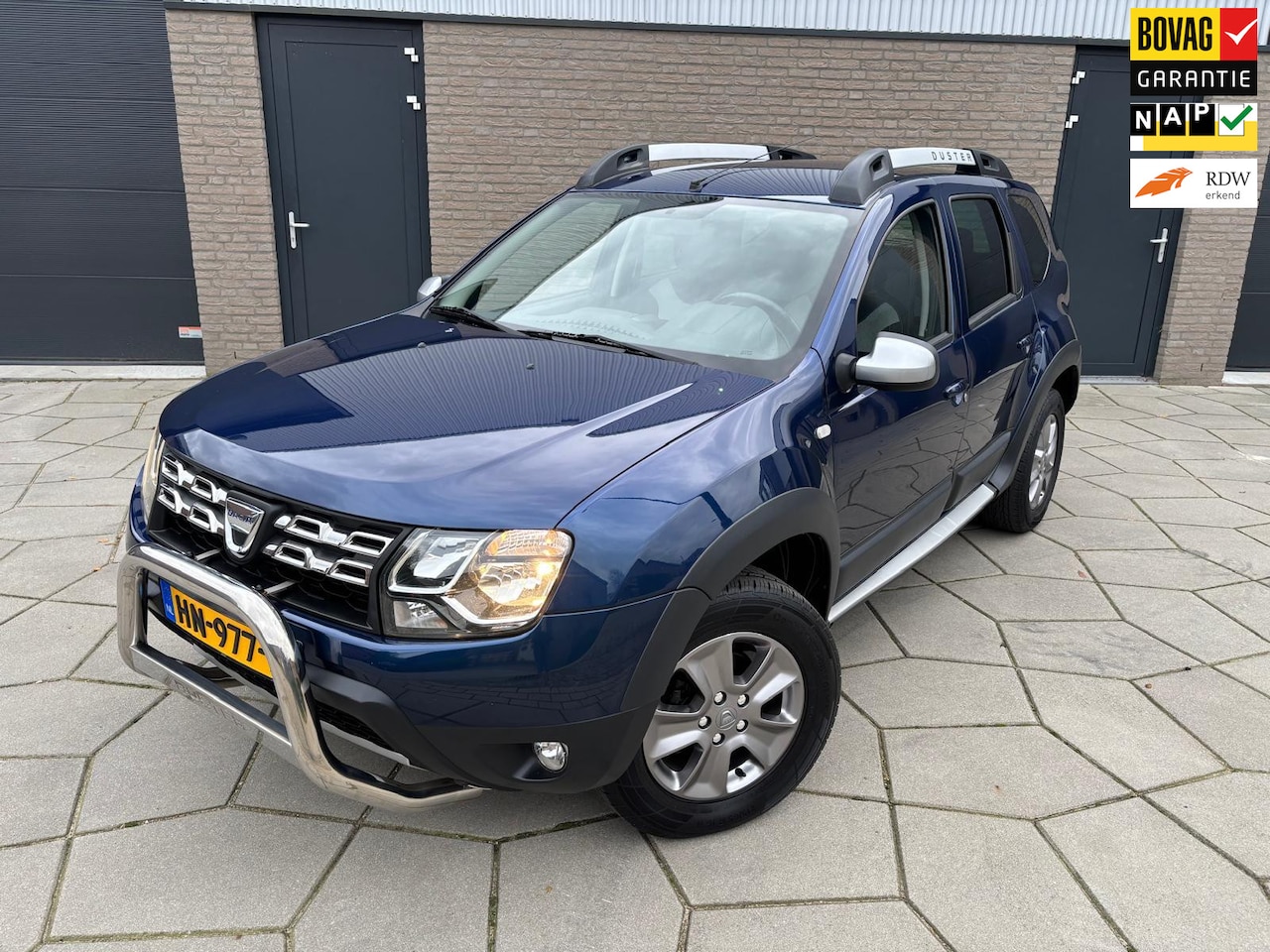Dacia Duster - 1.2 TCe 4x4 Lauréate| 4 WD|Trekhaak|Airco|Dakrails |Hoge Instap| - AutoWereld.nl