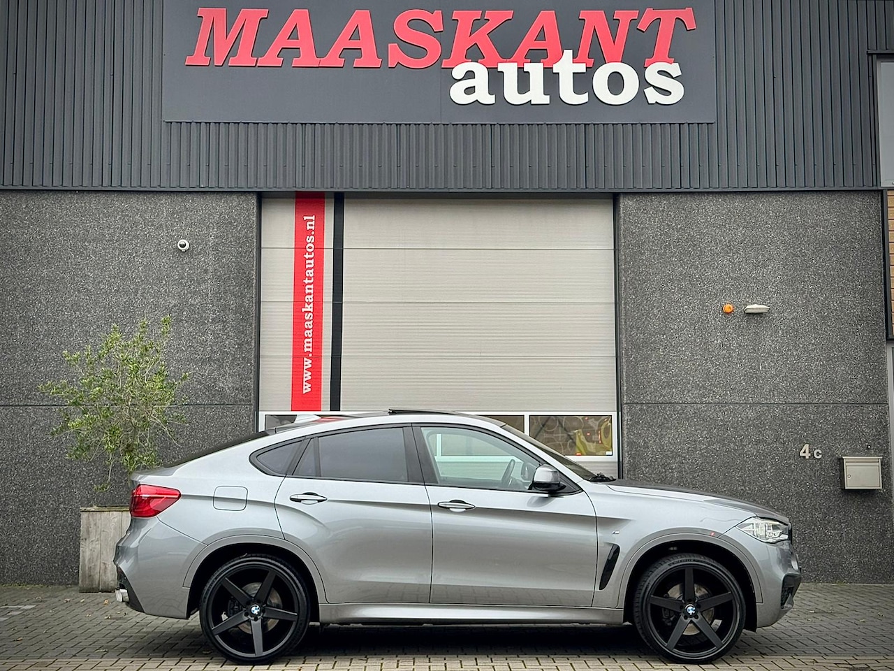 BMW X6 - xDrive35i / High Executive / M-sport / Sunroof / Adaptive cruise / Hud / ONLY 92497KM! - AutoWereld.nl