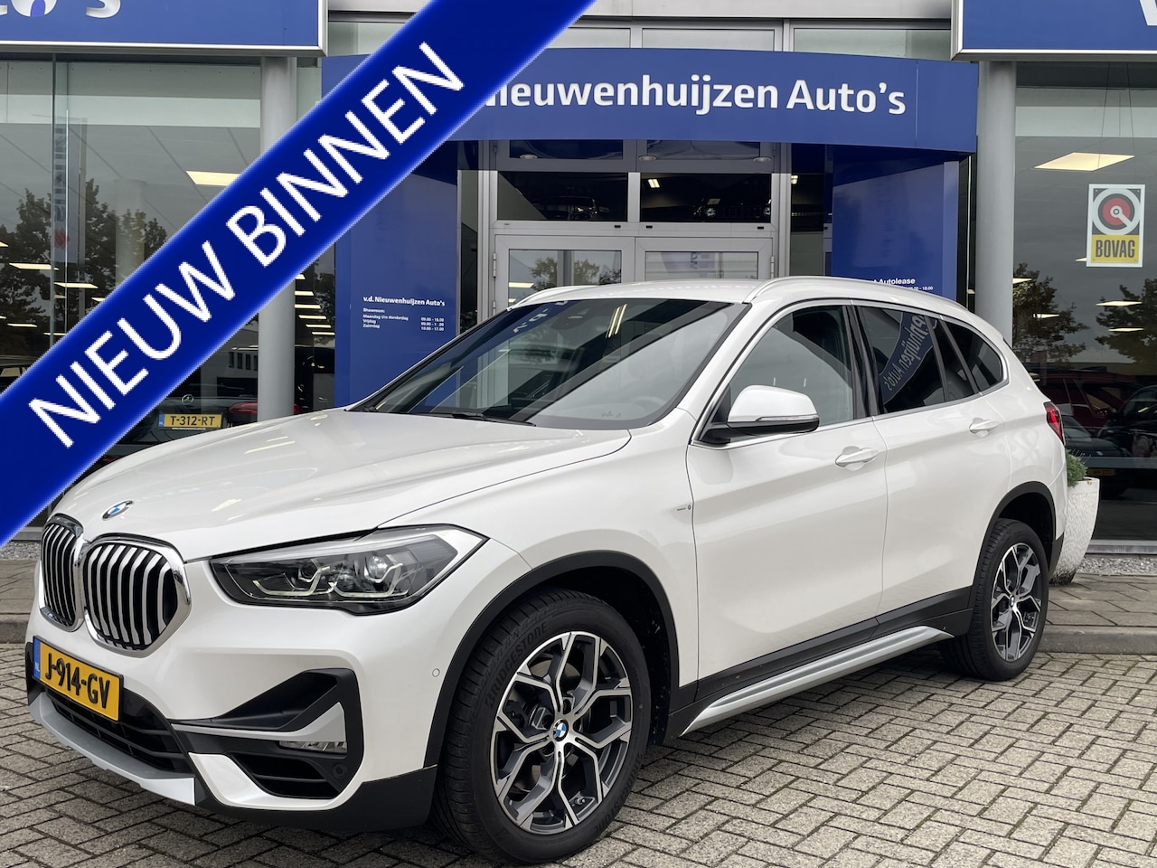 BMW X1 - sDrive20i High Executive | Stoelverwarming | Led | Leder | Sfeerverlichting | - AutoWereld.nl