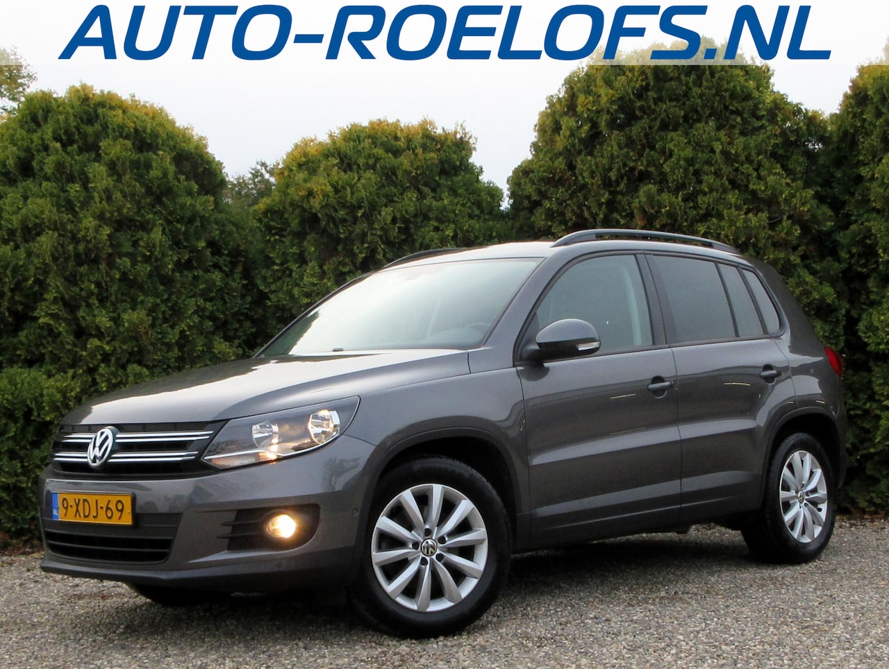 Volkswagen Tiguan - 1.4 TSI Comfort&Design Edition *Navi*ECC* - AutoWereld.nl