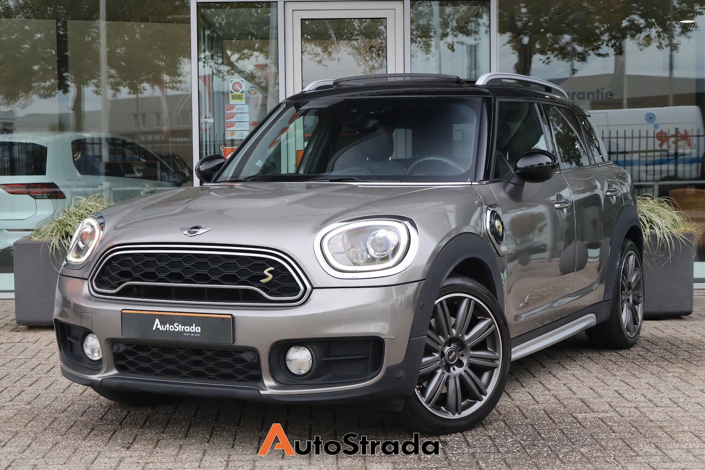 MINI Countryman - 1.5 Cooper SE 224pk ALL4 I Pano I LED I Climate I Stoelverwarming I Leder | Carplay | Came - AutoWereld.nl
