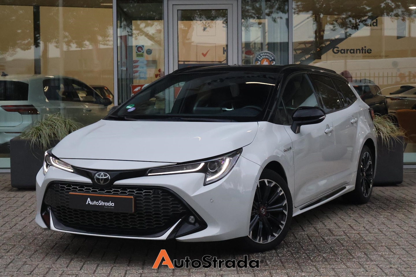 Toyota Corolla Touring Sports - 1.8 GR-Sport 122pk | Camera | Steolverwarming | LED | Adaptive | Climate | Carplay - AutoWereld.nl