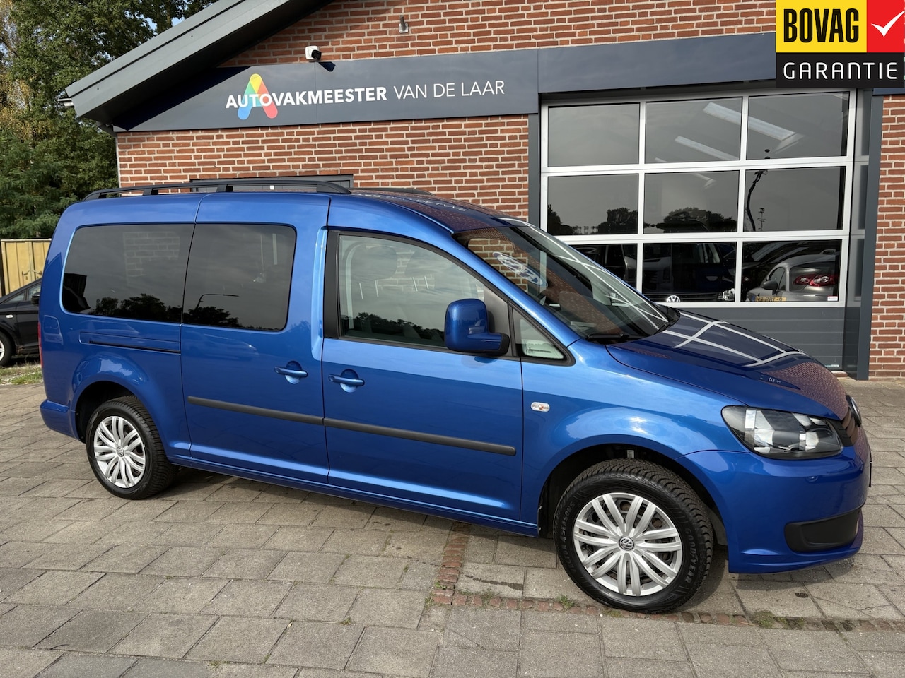 Volkswagen Caddy Maxi - 1.2 TSI Trendline 77kw  Life 7 pers. ( Navigatie, Parkeersensoren, Cruise Control) RIJKLAA - AutoWereld.nl