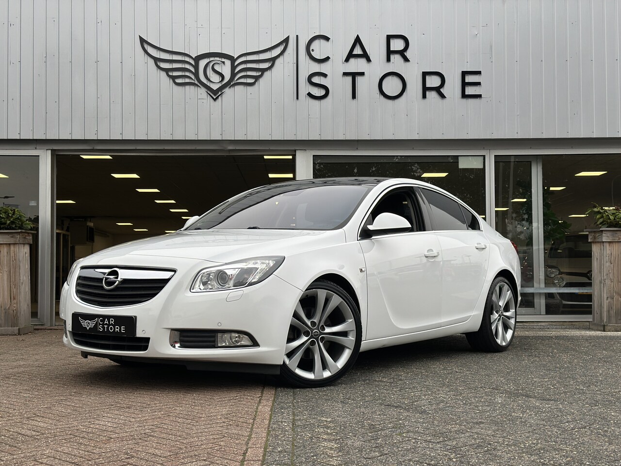 Opel Insignia - 2.0 T Sport 4x4 220PK|CLIMA|CRUISE|STOEL VWM|PDC|ELK.PAKKET|LEDER|REVISIE MOTOR - AutoWereld.nl